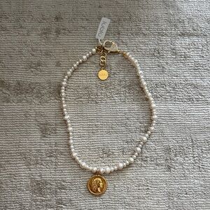 Elegant Gold and Cream Pearl Necklace